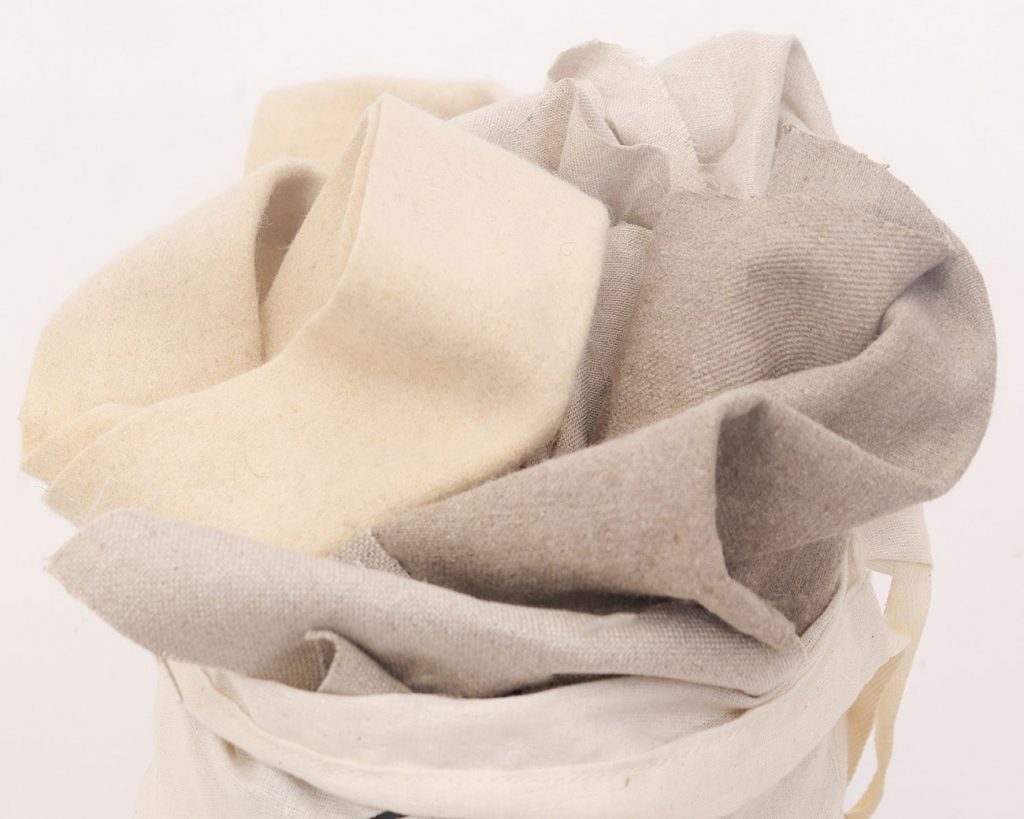 Home of Wool bag of fabric scraps - wool, linen, silk and cotton fabrics detail