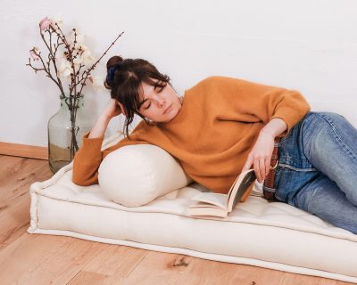 Home of Wool bolster cushion in setting