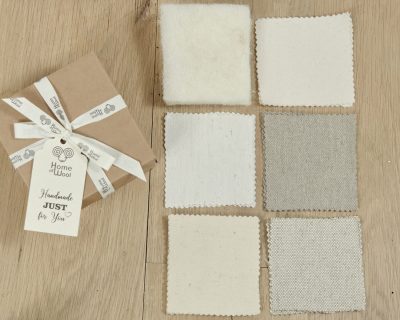 Home of Wool montessori fabrics box - fabrics and batting lined up