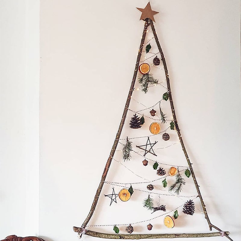 Holidays Go Zero Waste - handmade Christmas tree with branches, pinecones and oranges